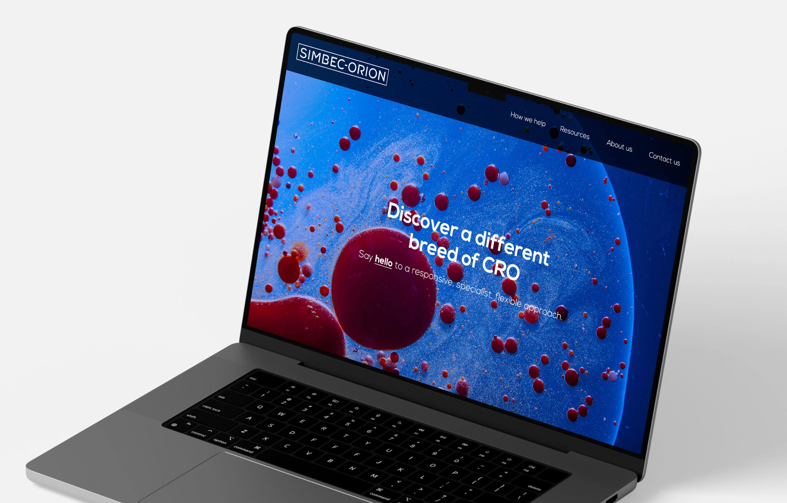Simbec-Orion website shown on a laptop