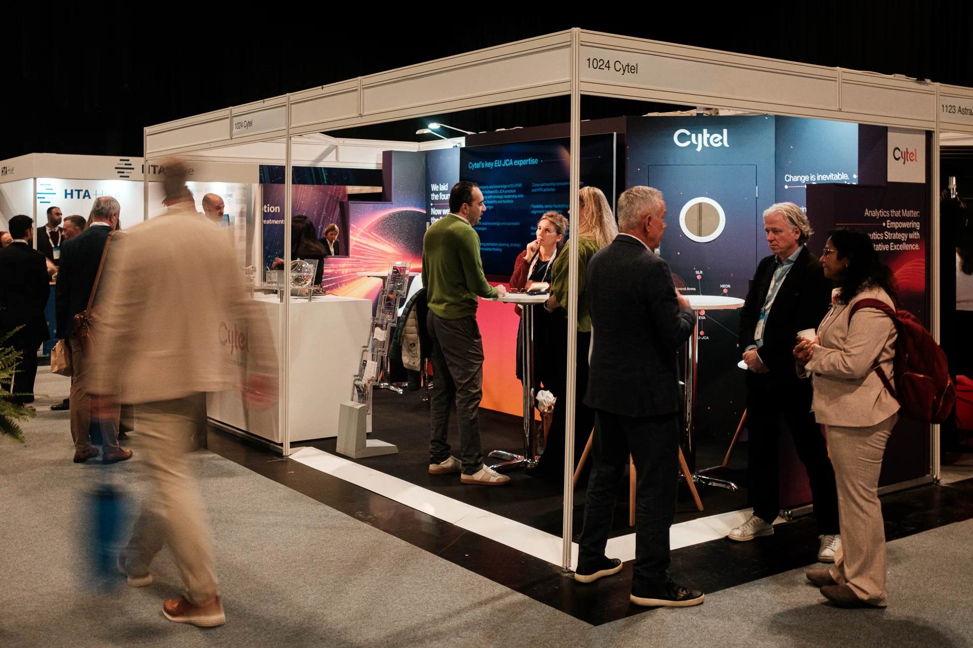 Visitors at the Cytel exhibition stand at a conference