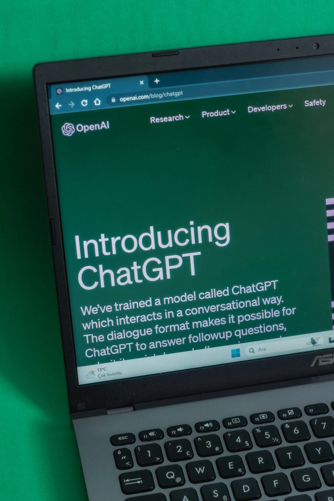Laptop screen showing the Introducing ChatGPT page