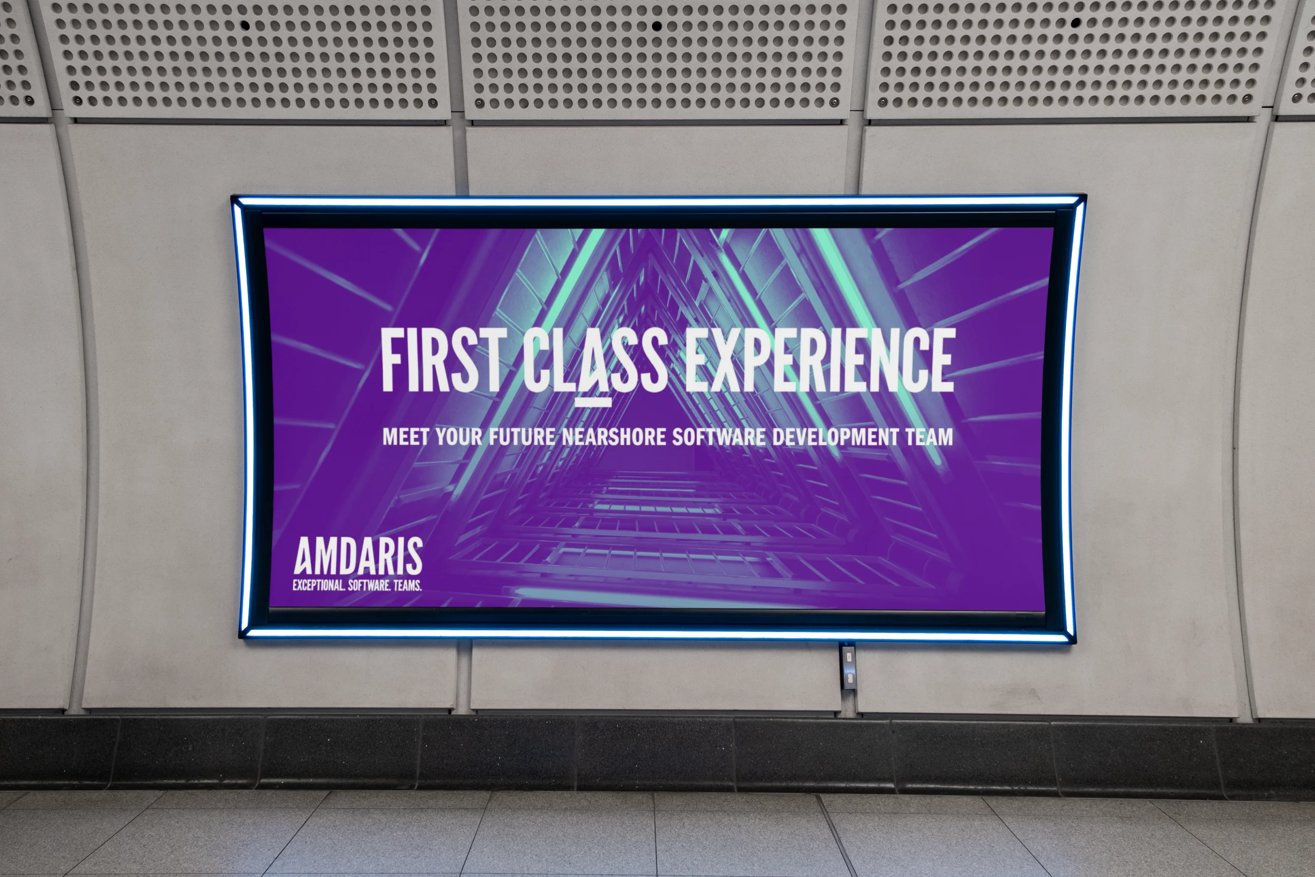Amdaris "First Class Experience" billboard in an underground station