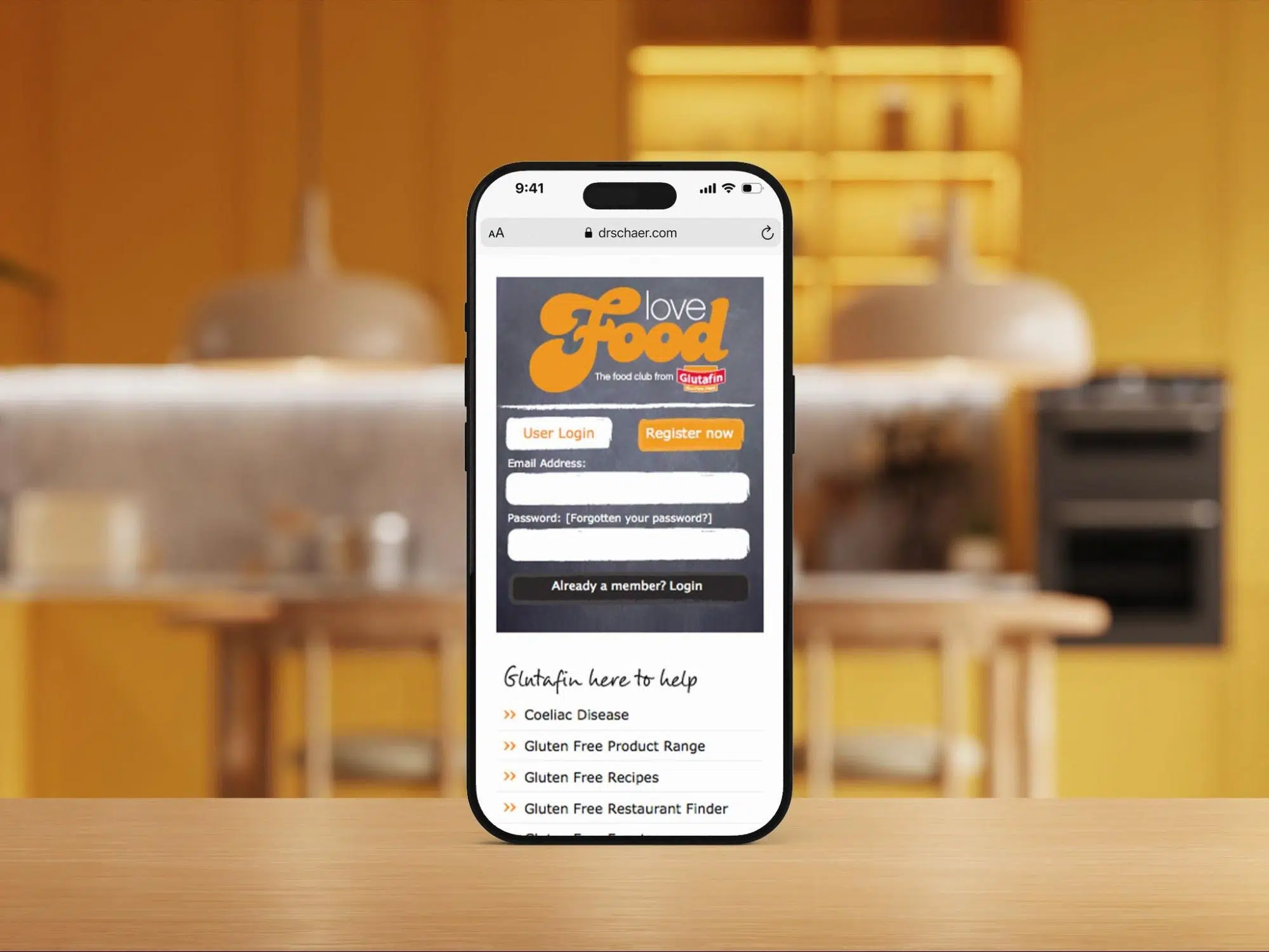 Love Food gluten-free website shown on a smartphone in a kitchen
