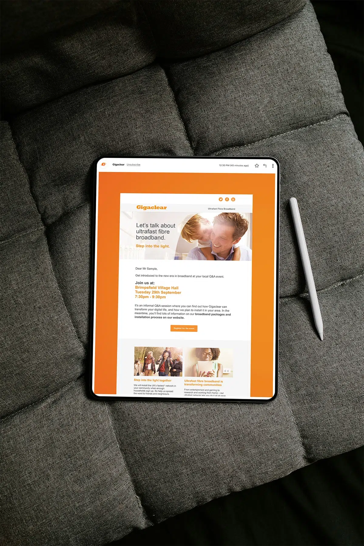 Orange broadband website shown on a tablet beside a stylus