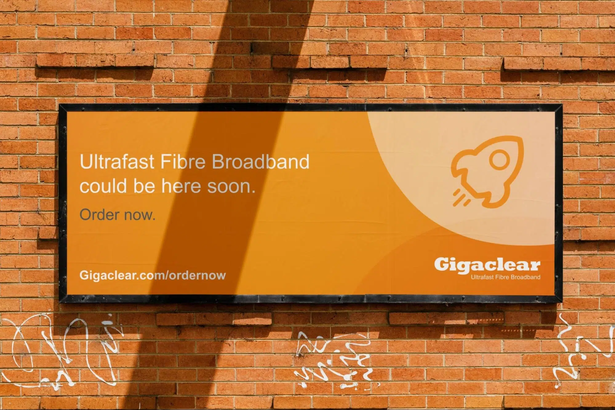 Gigaclear ultrafast fibre broadband billboard on a brick wall