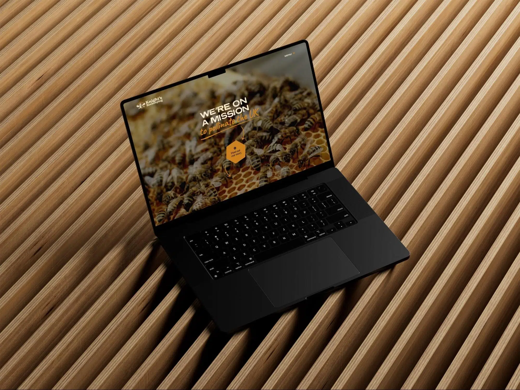 Honey brand website shown on a laptop on wooden slats