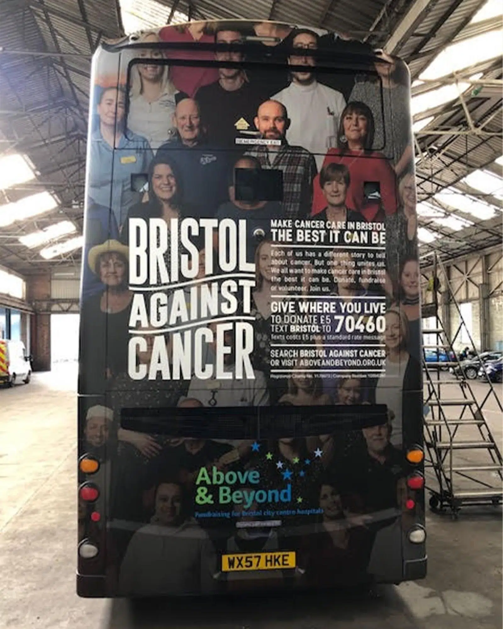 Bristol Against Cancer advert wrapped on the back of a bus