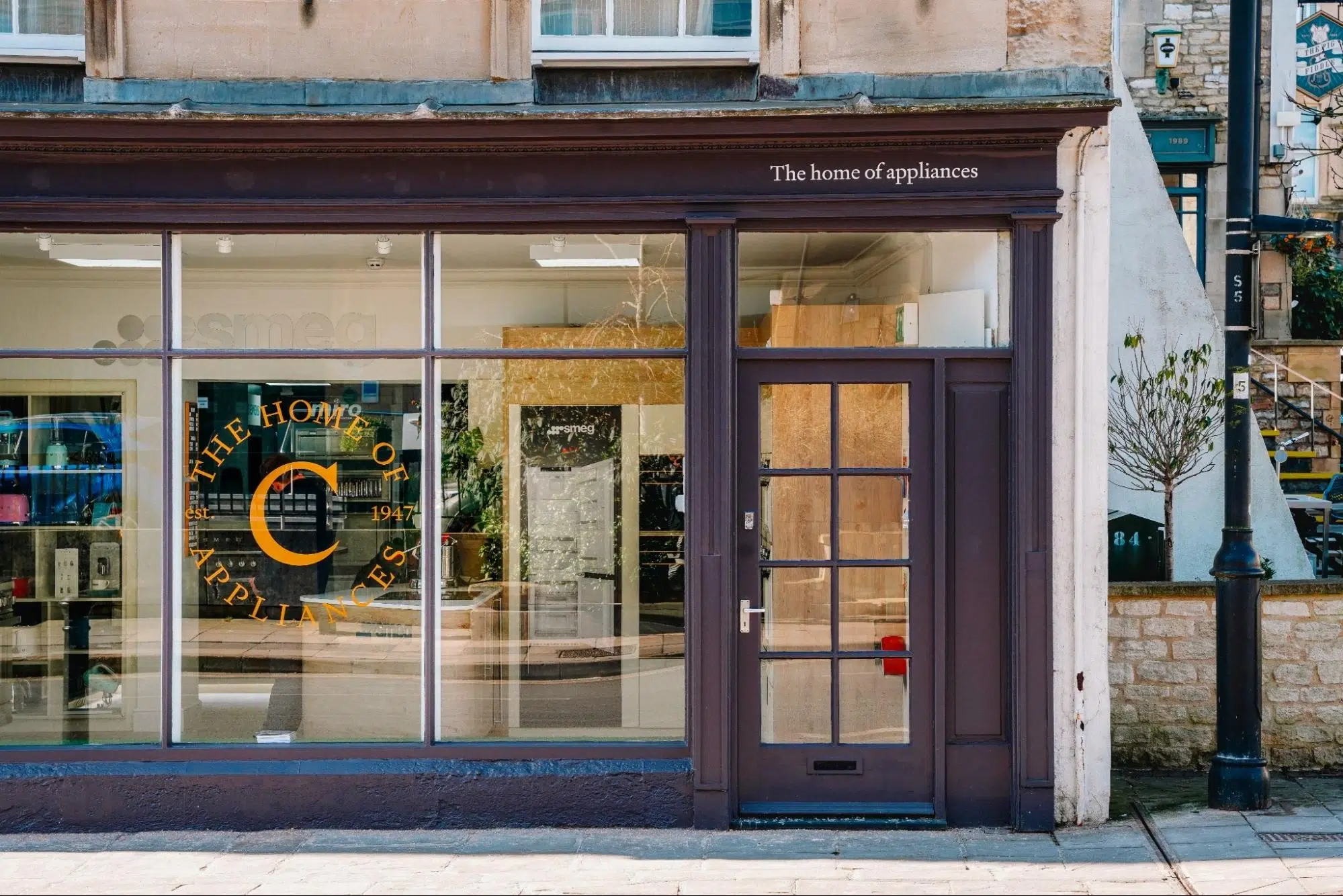Coopers appliance shop front on a stone high street